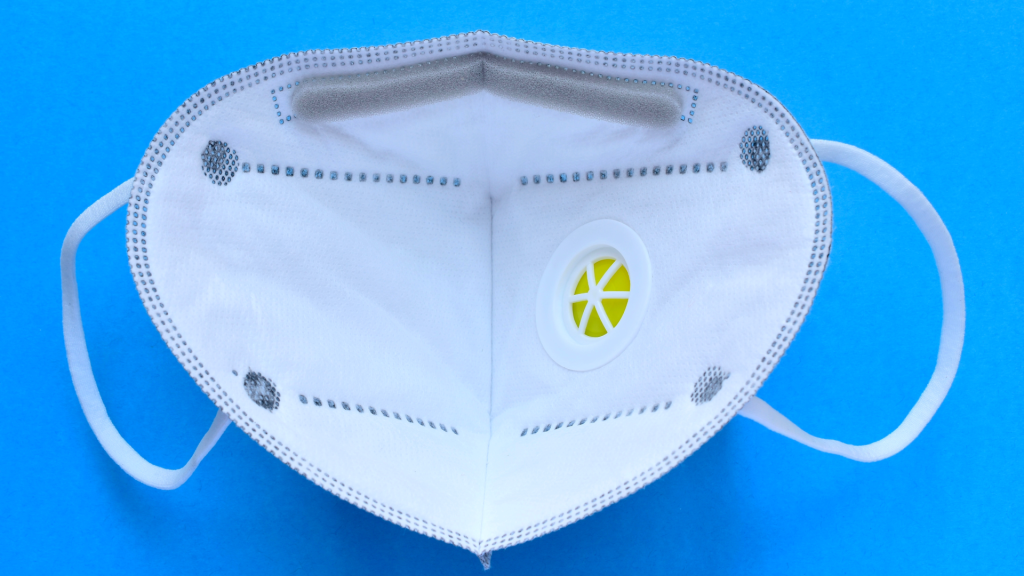 Medical face mask with valve, representing respiratory protection and testing standards