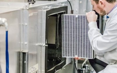 Airmid Healthgroup technician analyzing HVAC filter performance against infectious aerosols in line with ASHRAE and ISO standards.