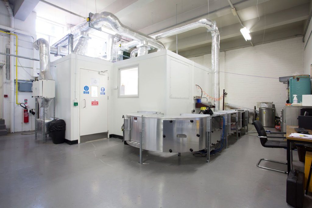Aerobiology test chamber at Airmid Healthgroup used for measuring bioaerosol emissions from air conditioners and HVAC devices