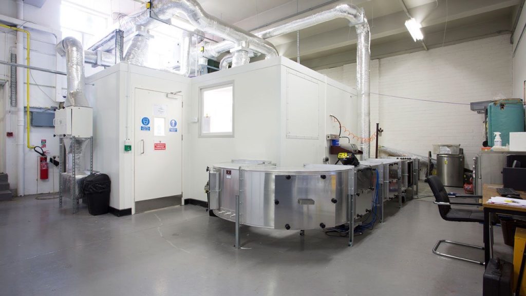 Aerobiology test chamber at Airmid Healthgroup used for measuring bioaerosol emissions from air conditioners and HVAC devices
