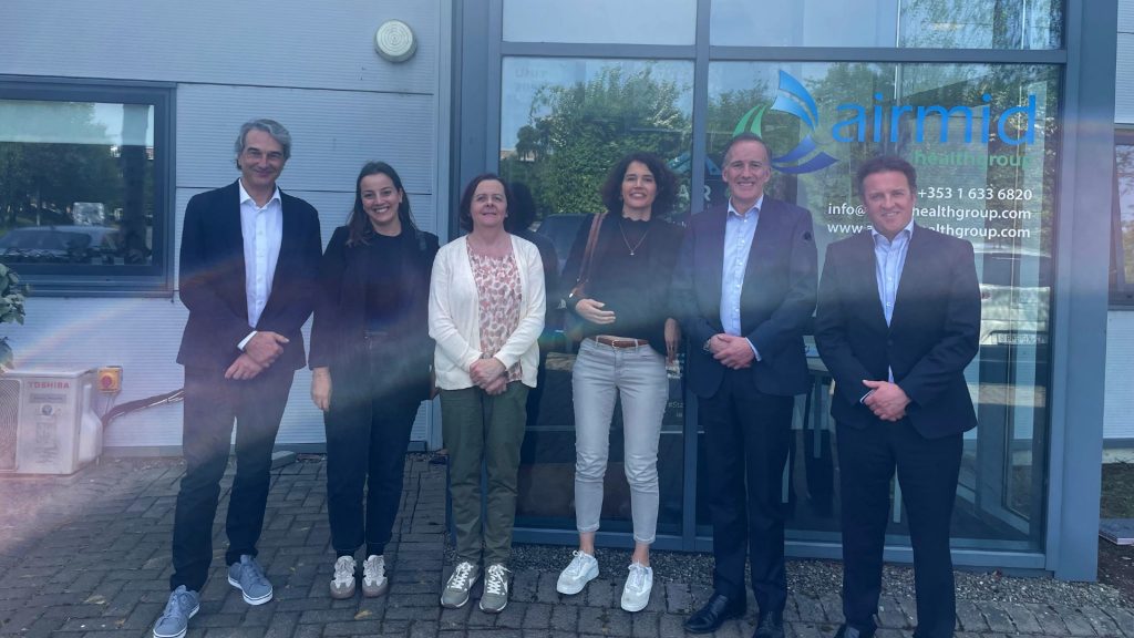 Swissatest and Airmid Healthgroup teams standing outside Airmid's Dublin facility following a strategic meeting on appliance hygiene and IAQ.