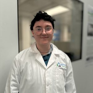 Arlo Bowe, Environmental Biologist at Airmid Healthgroup, conducting environmental sampling and testing in the laboratory.