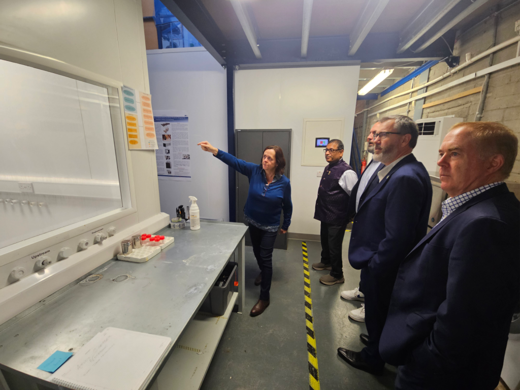 Professor Chandra Sekhar observes an infectious aerosol test room at Airmid Healthgroup’s accredited laboratory in Dublin.