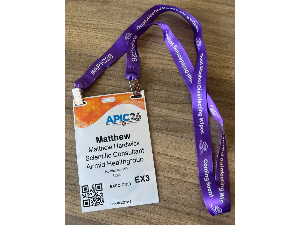 APIC 2026 conference badge and purple lanyard for Matthew Hardwick, Scientific Consultant at Airmid Healthgroup, GUV regulatory testing, Hyattsville, MD.