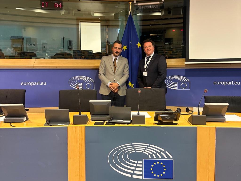 Dr John McKeon with Panagiotis-Minos Chaslaridis in a European Parliament committee room during the SynAir-G key findings event