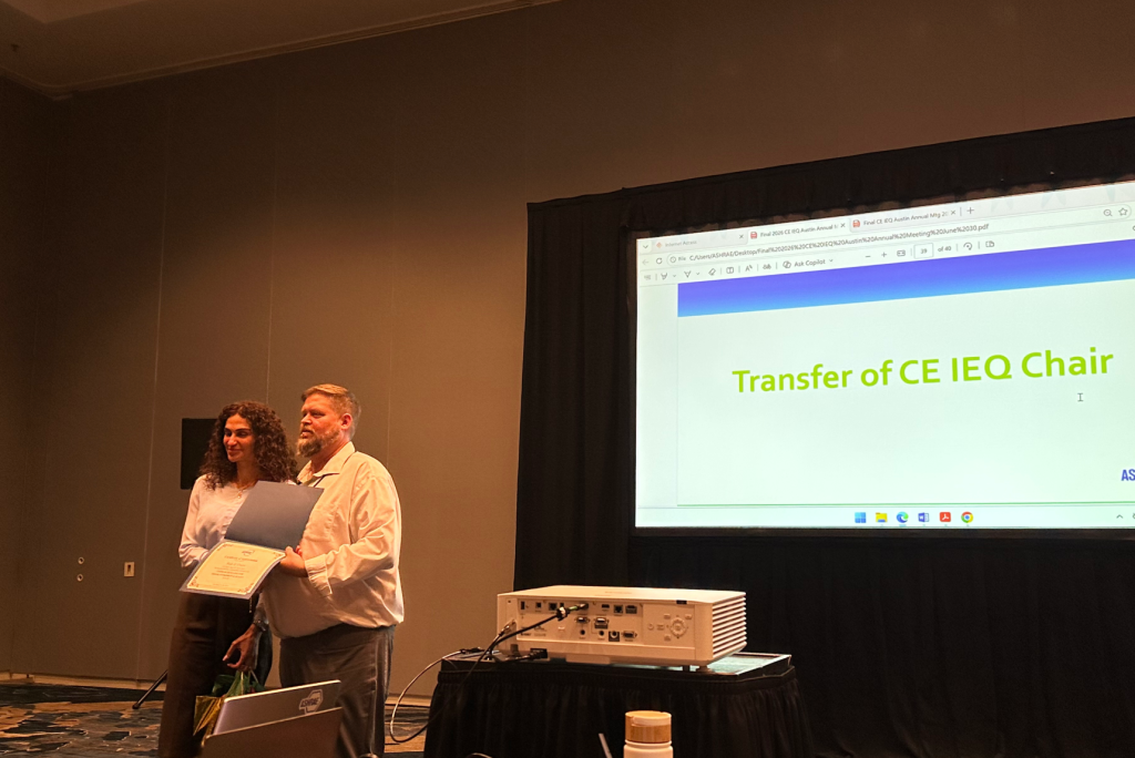 Dr Marwa Zaatari and Wade Conlan on stage at the transfer of the ASHRAE CE-IEQ Chair at the 2026 ASHRAE Annual Conference